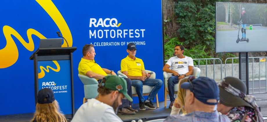 Panel of speakers on stage at RACQ Motorfest